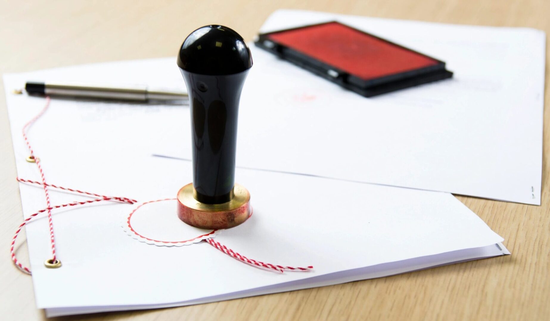 A rubber stamp sitting on top of some paper